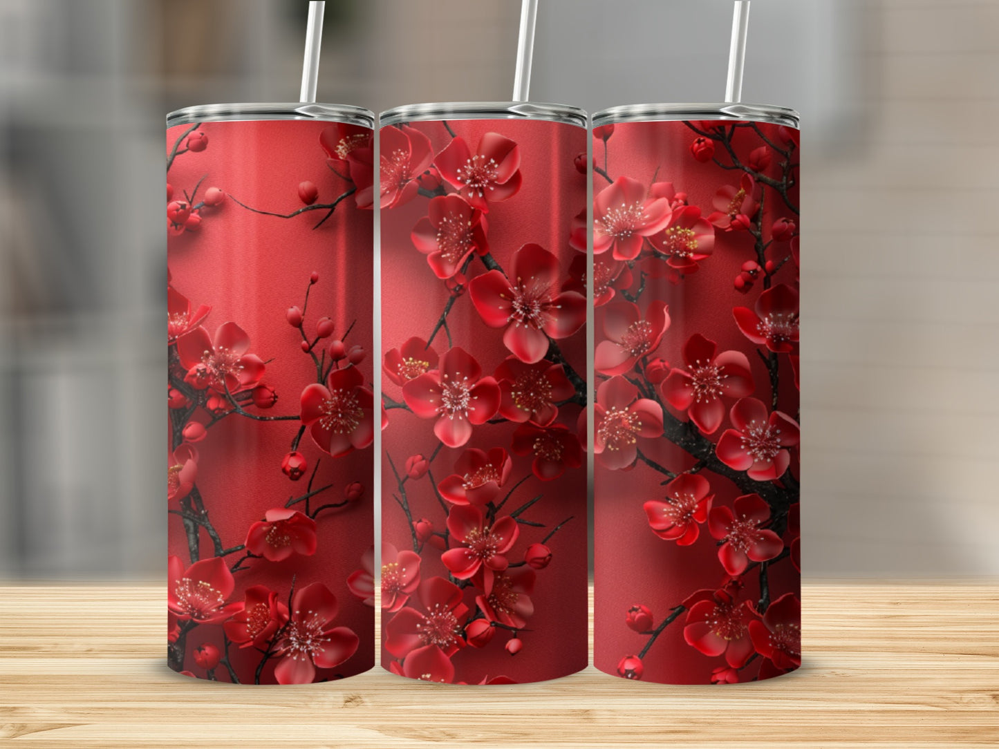Red tumbler with blooming cherry blossoms.