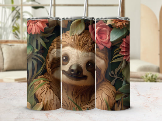 Sloth surrounded by lush green leaves and pink flowers on a tumbler.