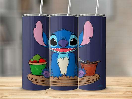 Stitch sitting between a bucket of strawberries and gardening tools.