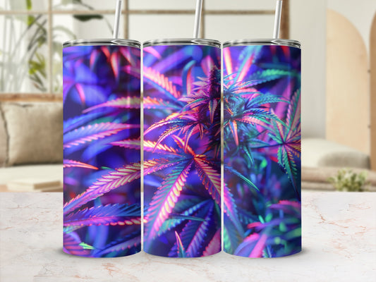 Three tumblers with colorful cannabis leaf design on marble surface.
