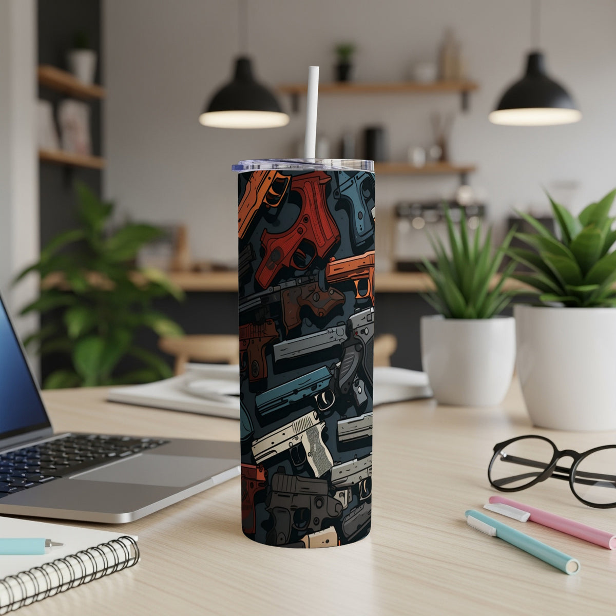 Tumbler with a repeating pattern of stylized handguns in various colors.