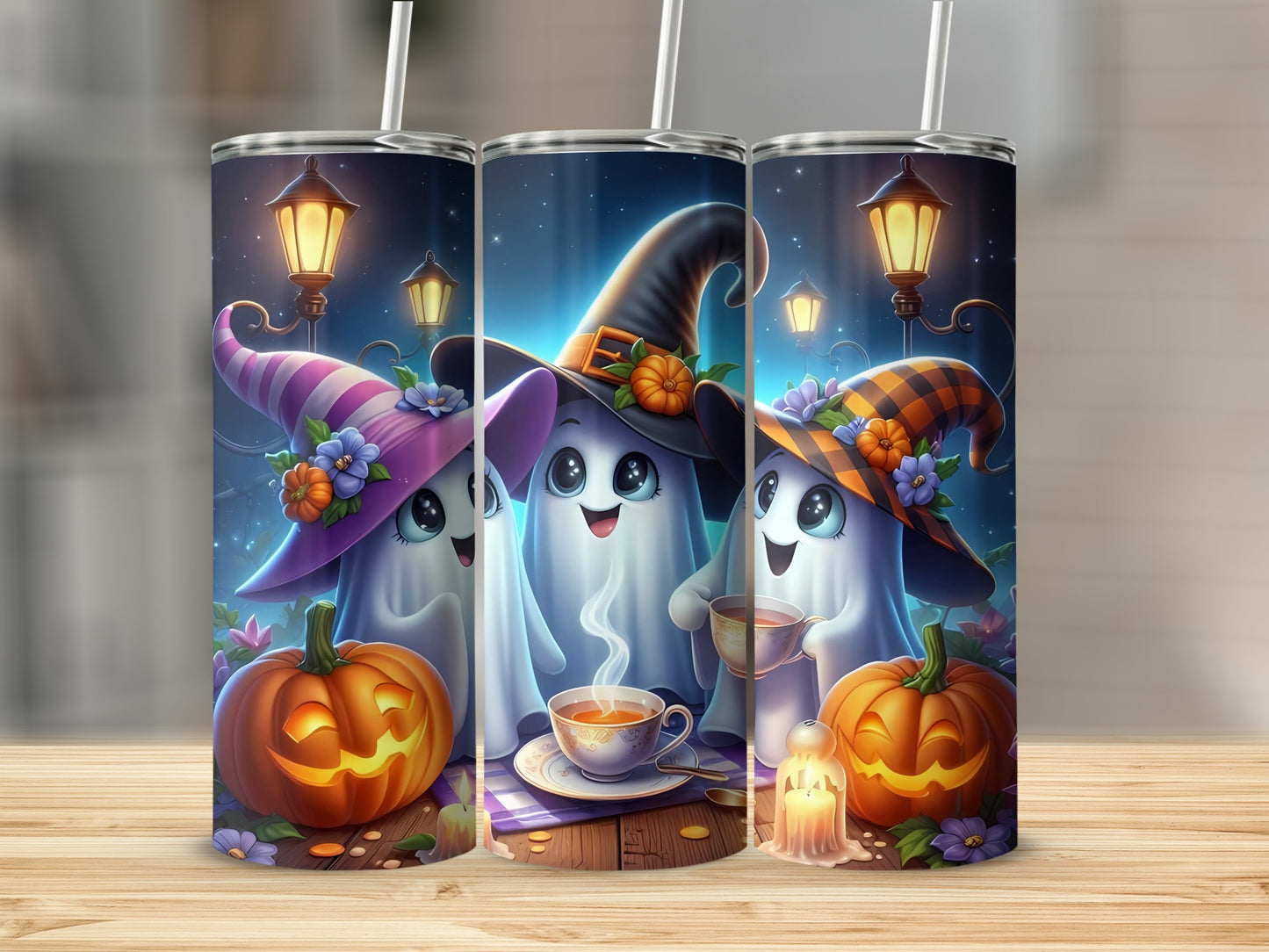 Three cute ghosts in Halloween hats with pumpkins and teacups on a wooden table.