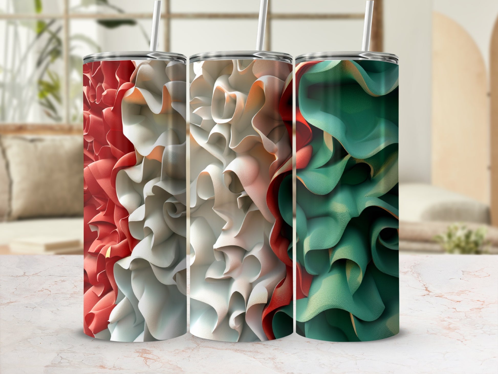Three tumblers with swirling red, white, and green abstract floral patterns.