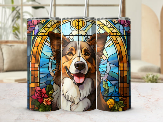 Stained glass tumbler with a happy dog portrait against a floral background.