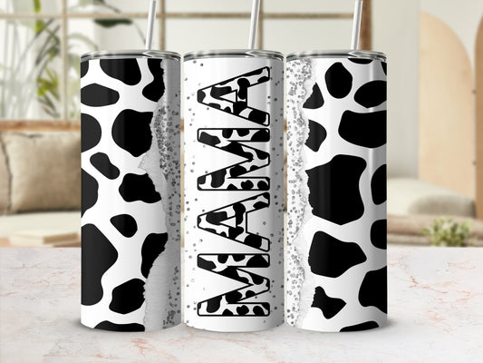 Cow print tumbler with "MAMA" text and glitter accents.