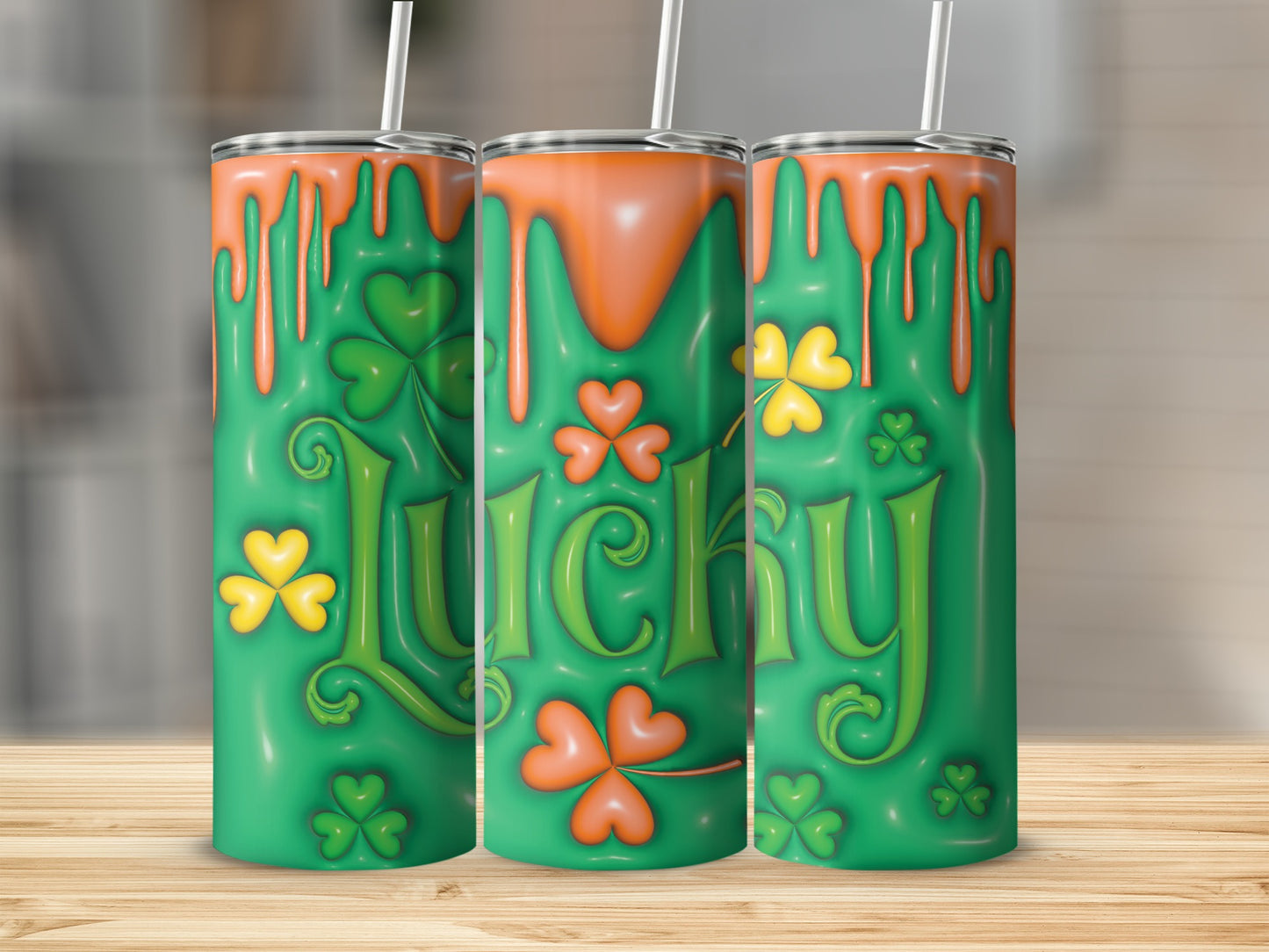 Green tumbler with orange drips, shamrocks, and "Lucky" text.