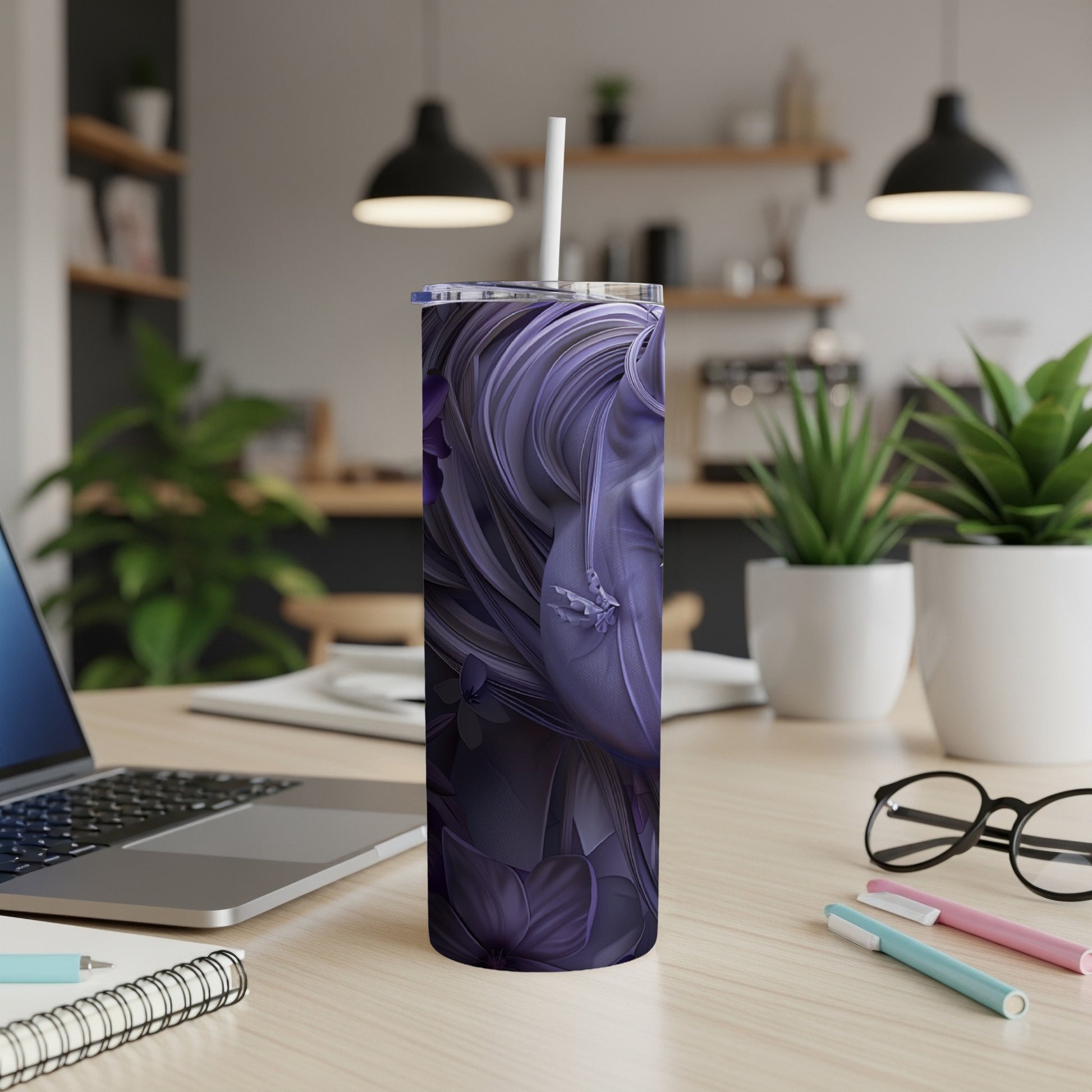 Purple floral abstract art on a white skinny tumbler with a straw.