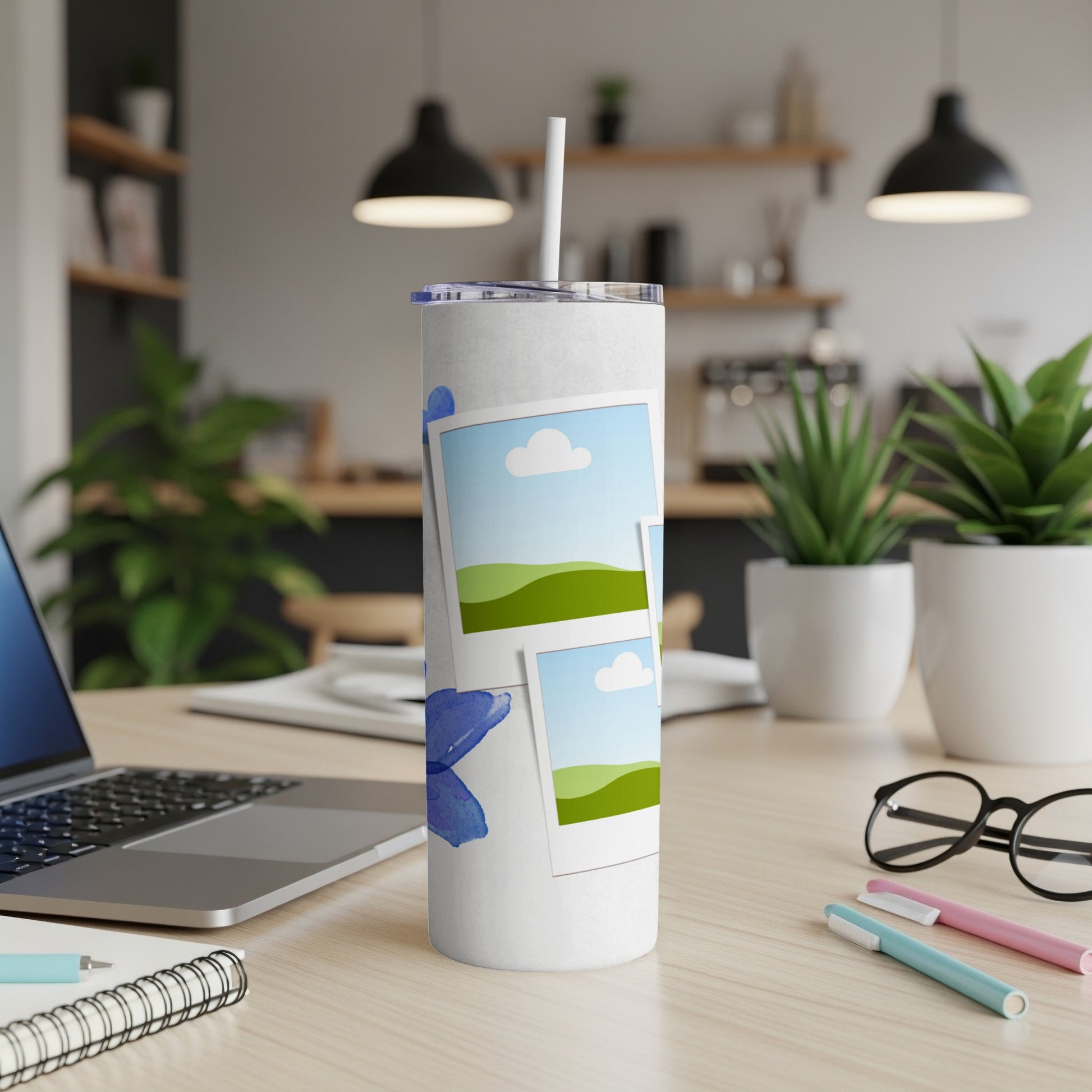 White tumbler with blue watercolor butterfly and photo frames design.
