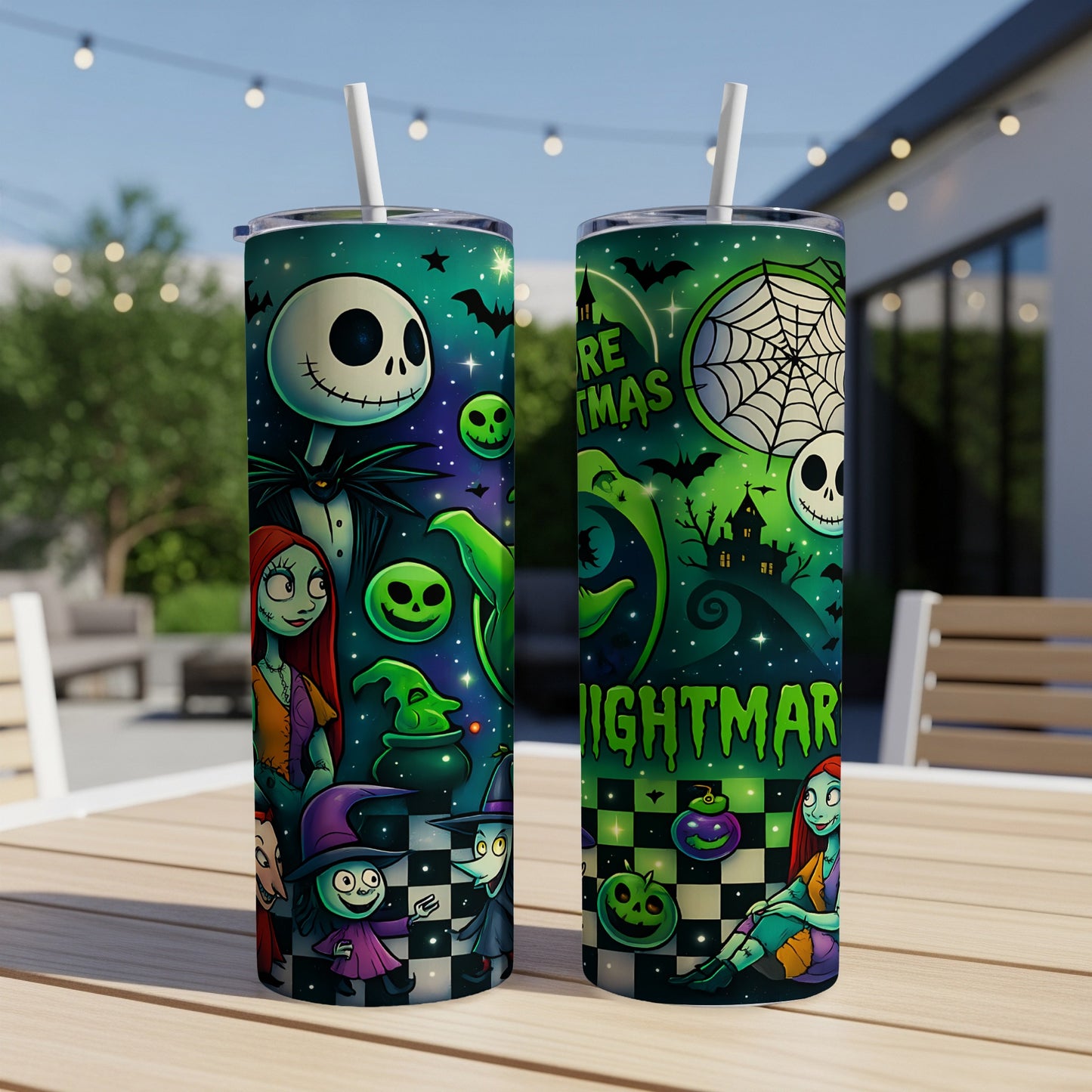 Two tumblers with Nightmare Before Christmas characters and text on a table outdoors.