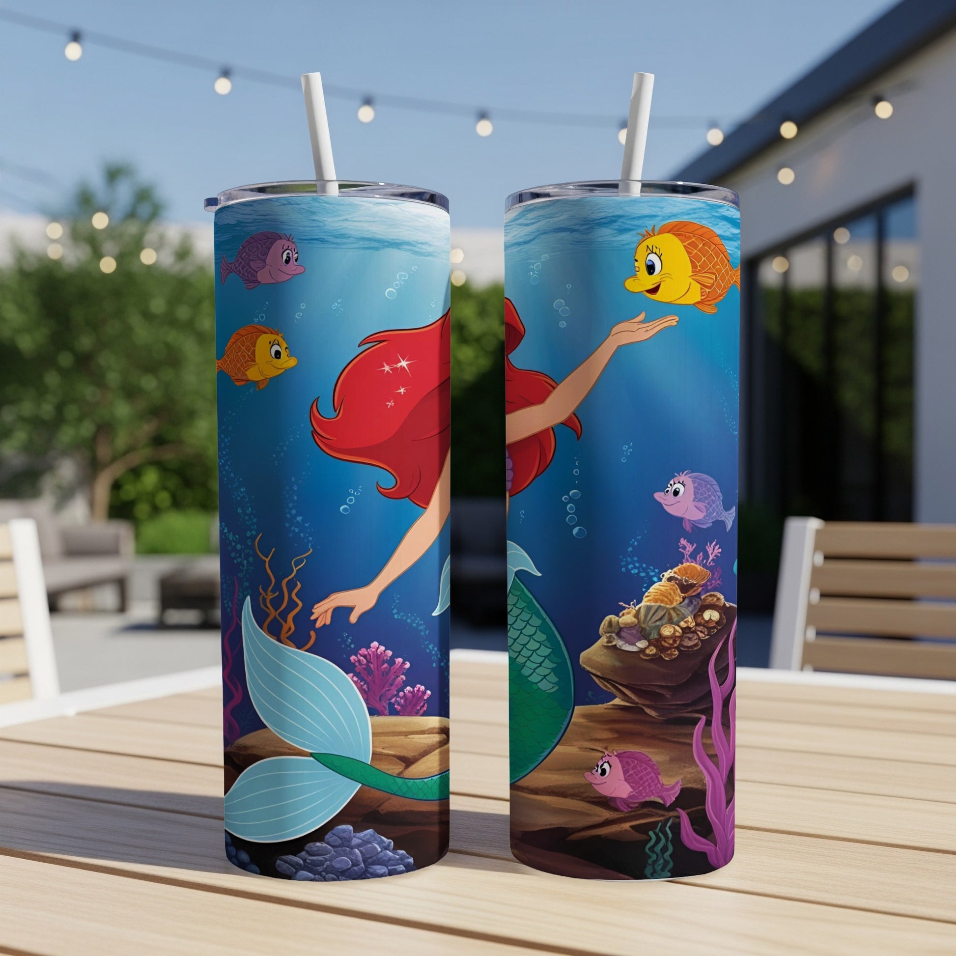 Ariel the Little Mermaid with fish and coral on a tumbler.