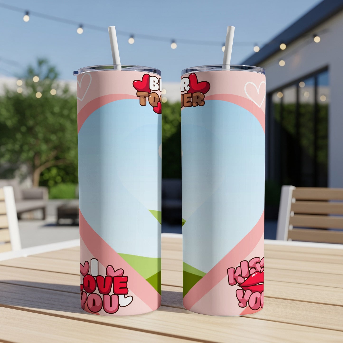 Two pink tumblers with Valentine's Day graphics, reading "Better Together" and "Kiss You."