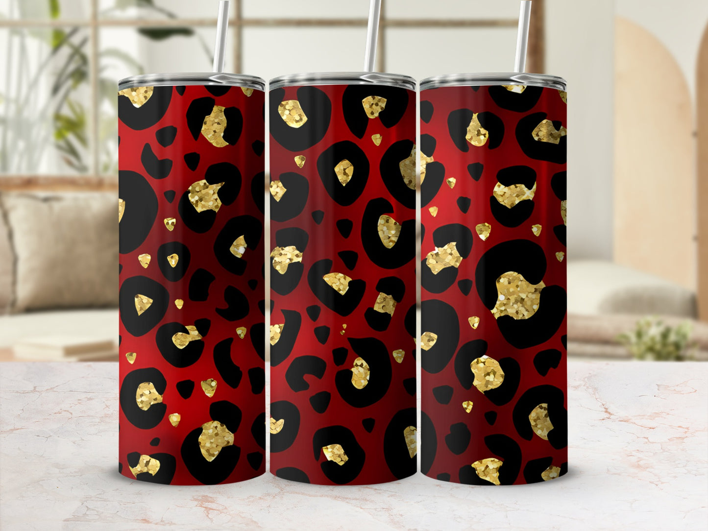 Three tumblers with a red and gold leopard print design.