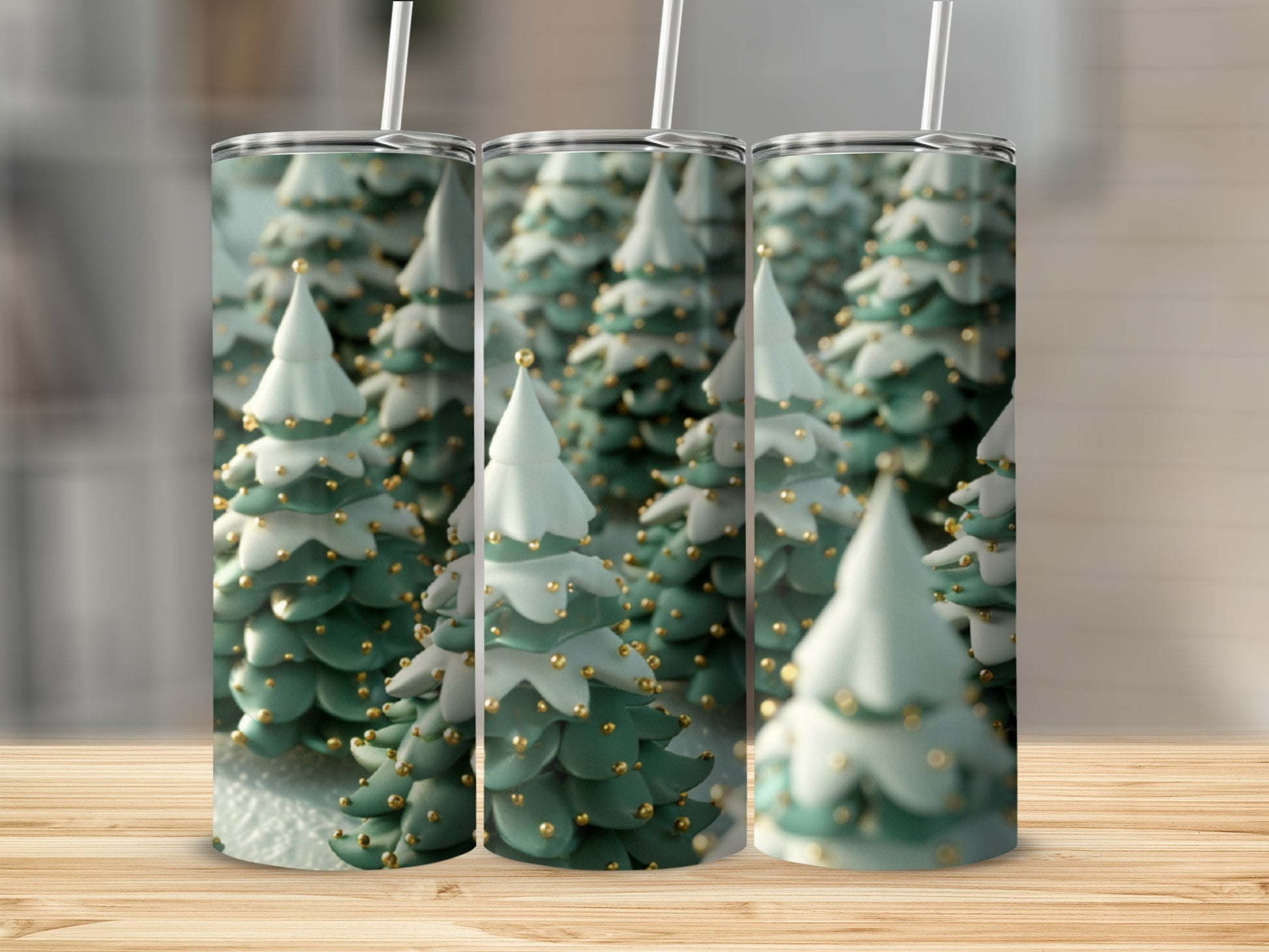 Three tumblers with a festive green Christmas tree pattern.