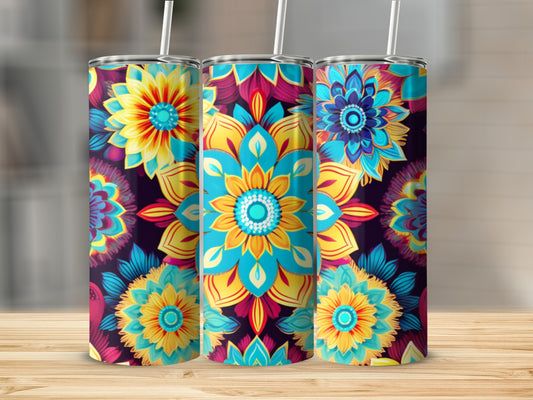 Three tumblers with vibrant floral mandala patterns in blue, yellow, and teal.