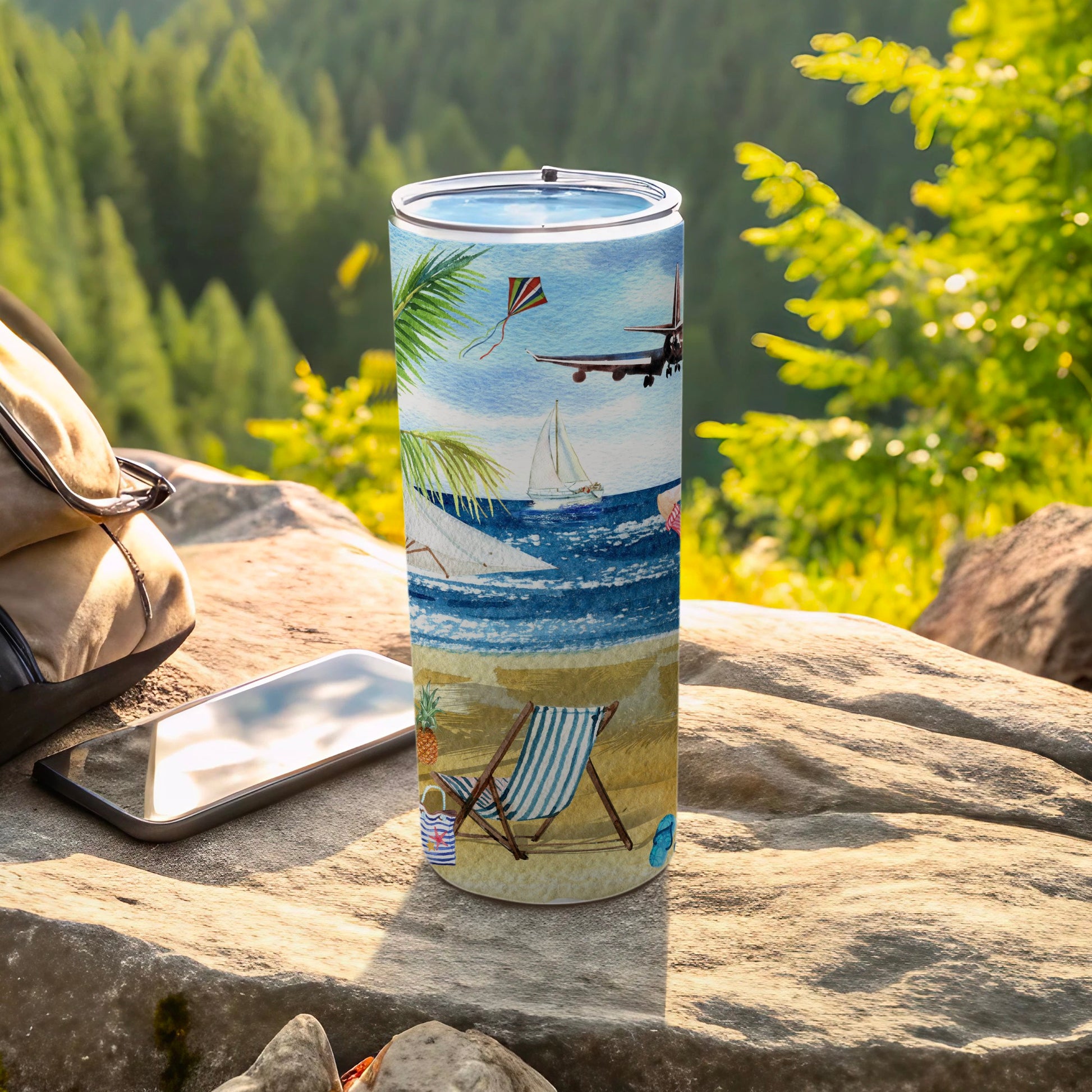 Beach scene with beach chair, umbrella, sailboat, and plane on a tumbler.