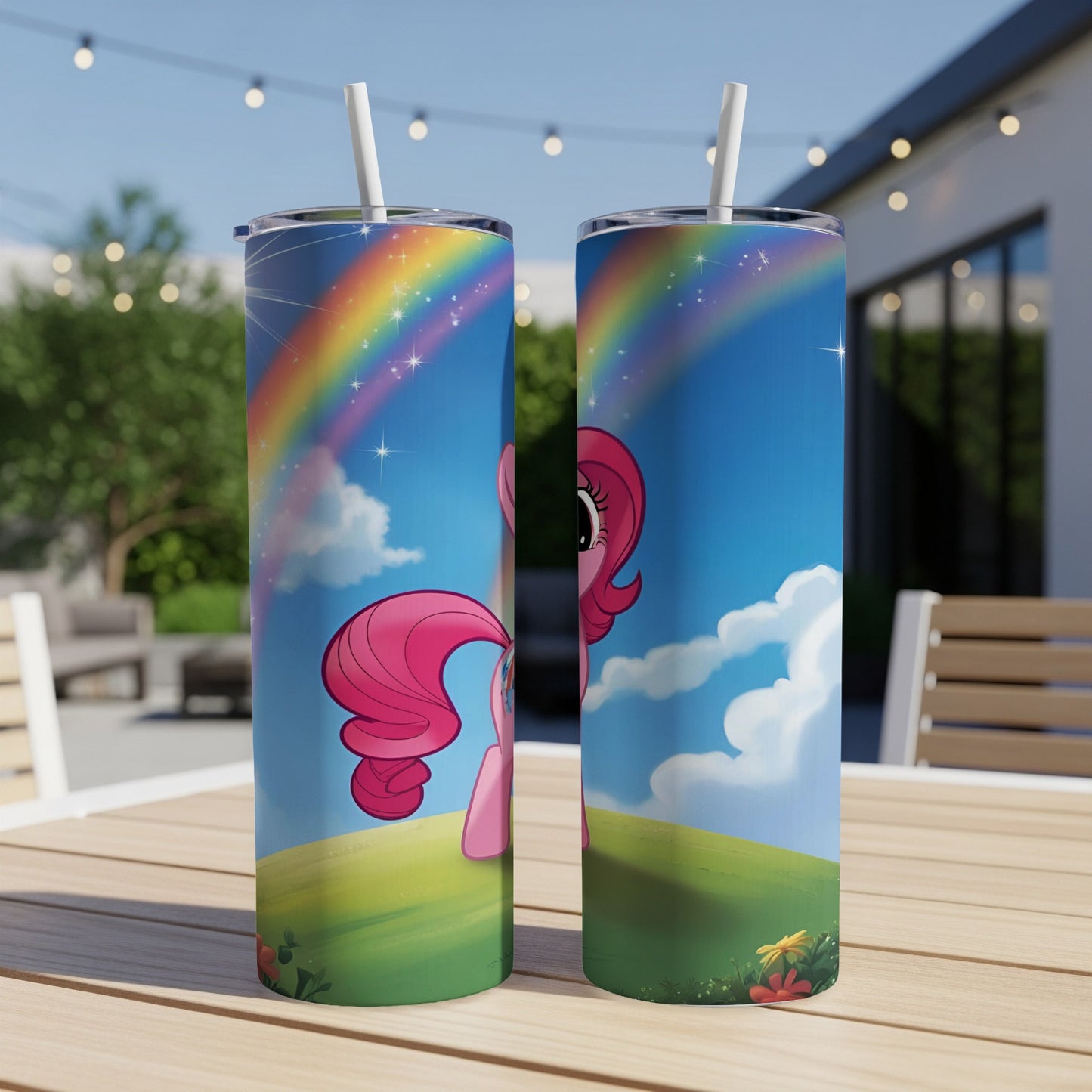 Pinkie Pie with rainbow on a grassy hill, standing on a table.