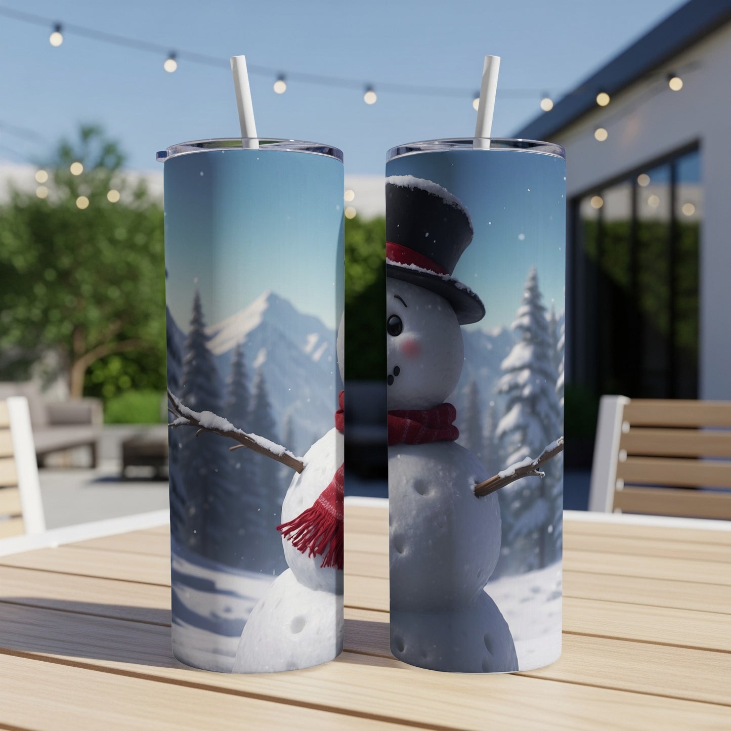 Two snowmen with top hats and scarves stand on a wooden table outdoors.