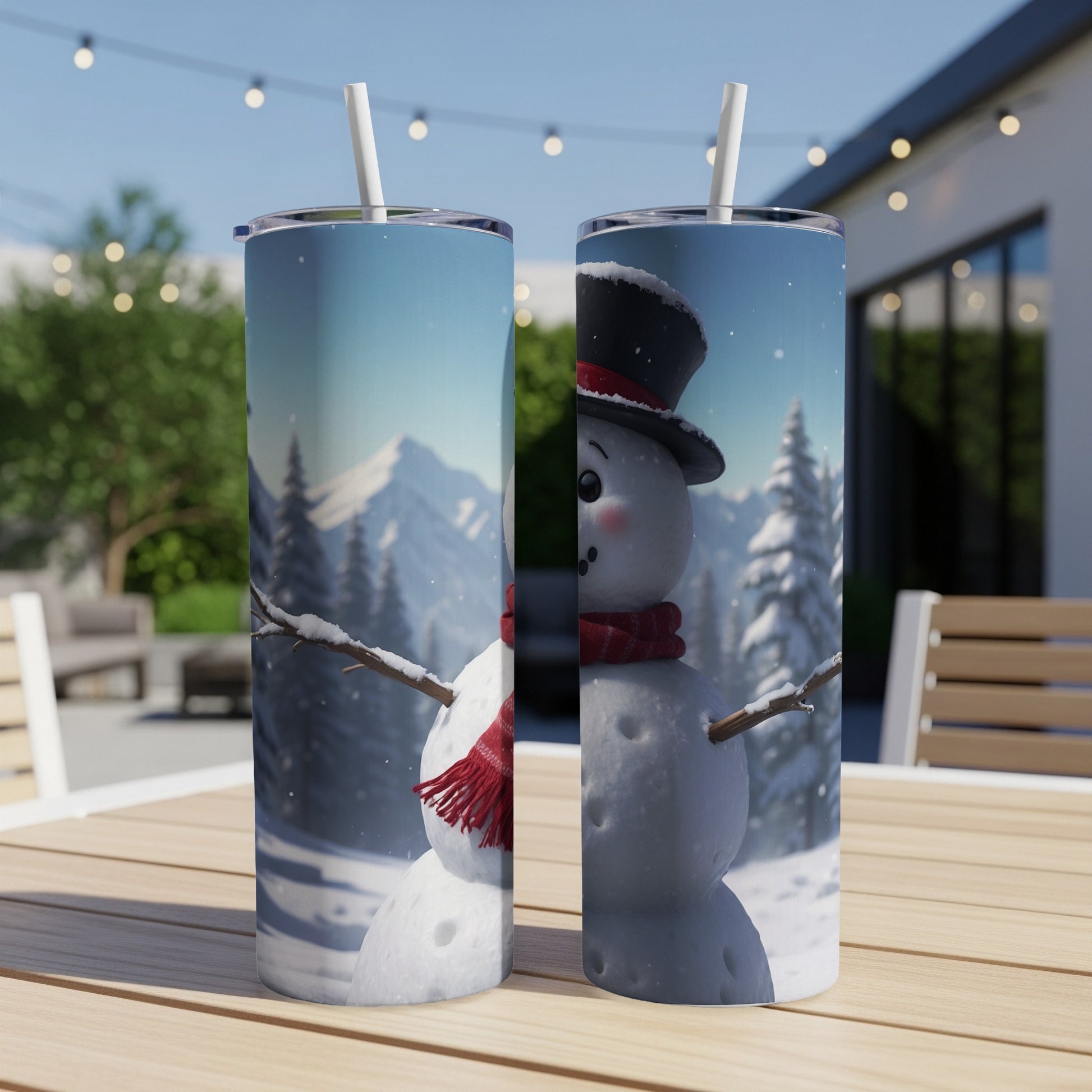 Two snowmen with top hats and scarves stand on a wooden table outdoors.