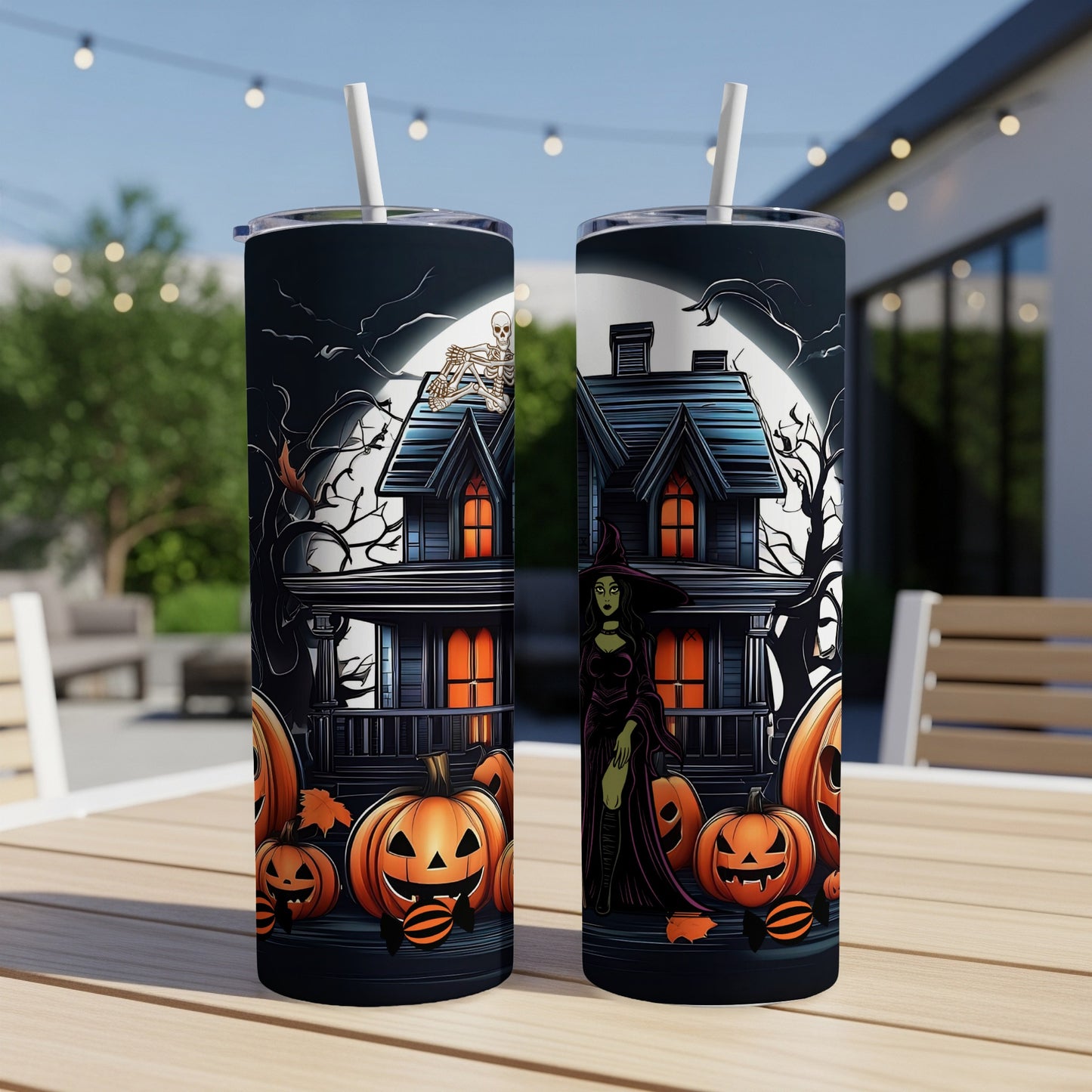 Halloween themed tumblers with witch, haunted house, and pumpkins.