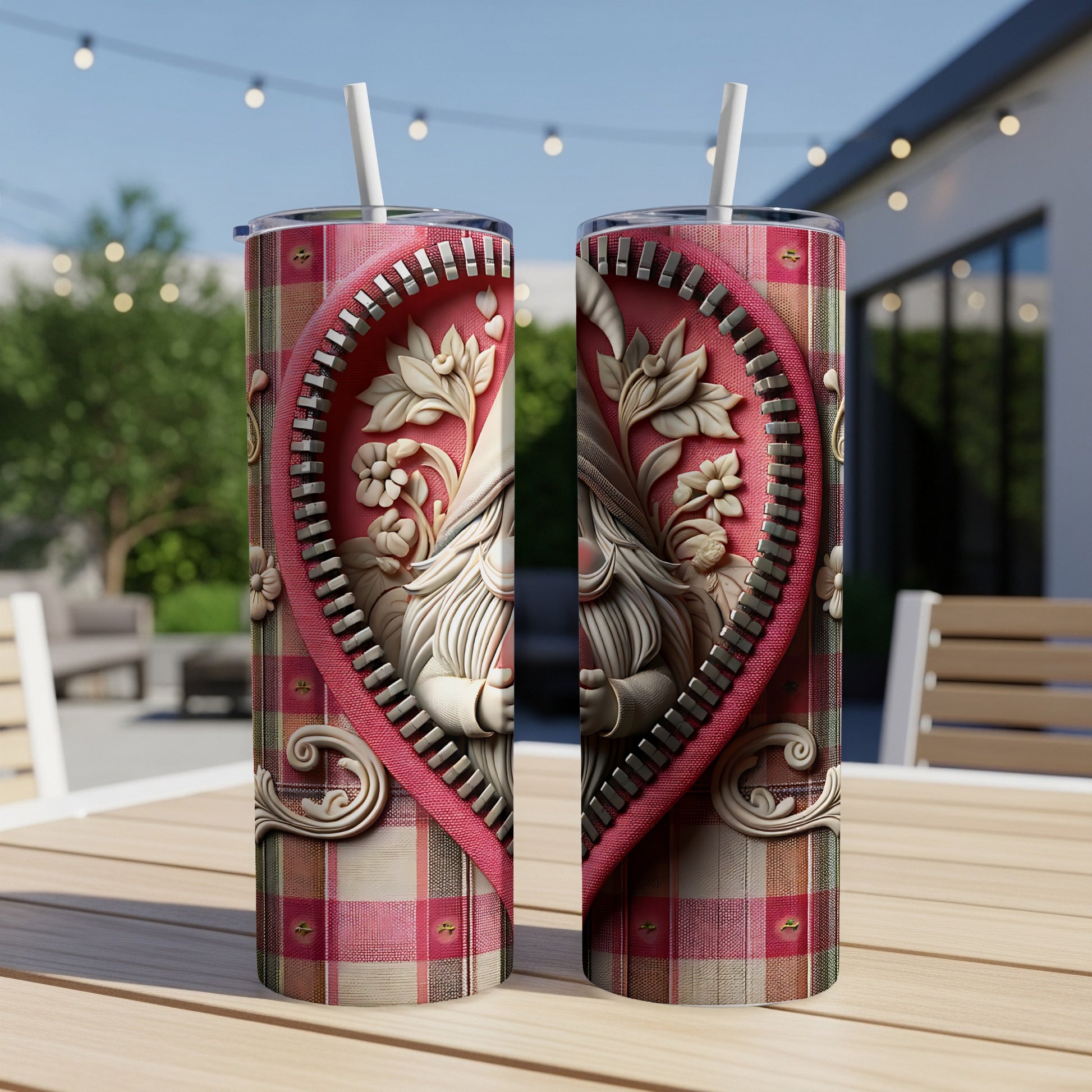 Heart-shaped gnome design on a plaid tumbler with straw.