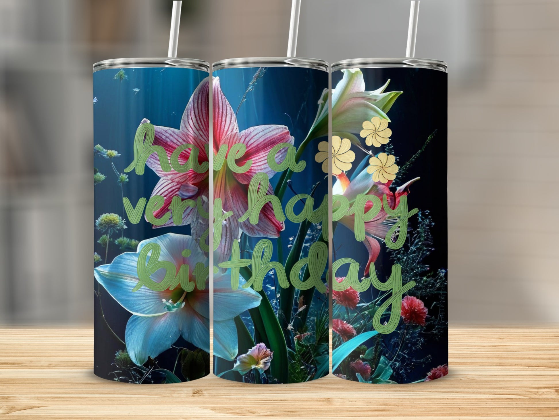 Birthday tumbler with flowers and "have a happy birthday" text.