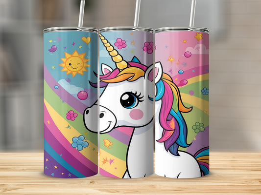 Three tumblers with unicorns and rainbows on a wooden surface.