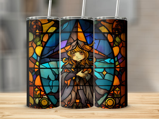 Stained glass witch design on a tumbler, centered with straws.