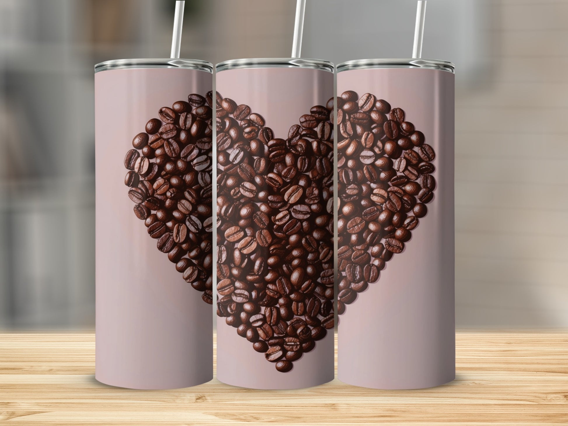 Three tumblers with a heart shape made of coffee beans on a pink background.