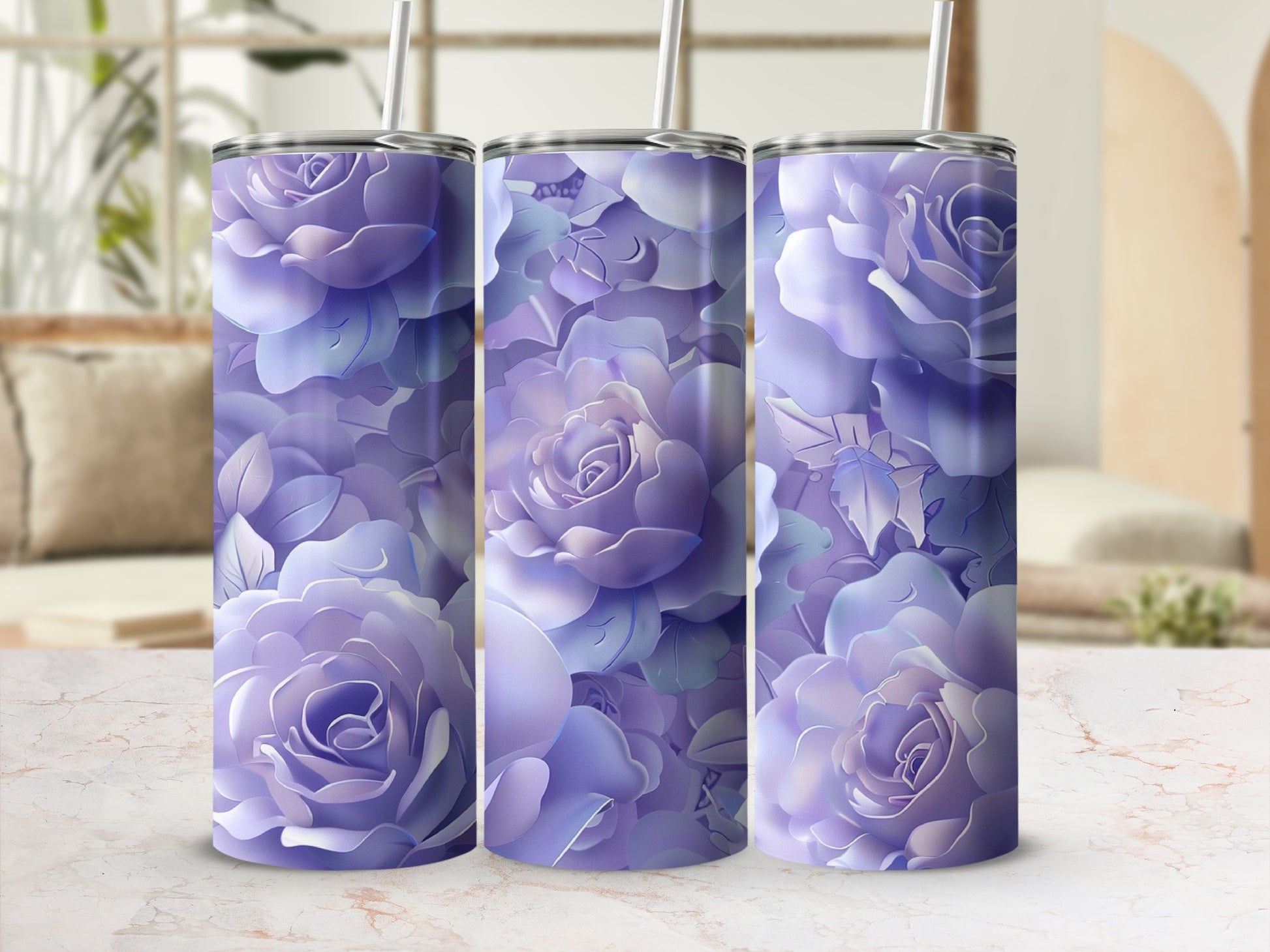 Three lavender floral tumblers with reusable straws on a marbled surface.