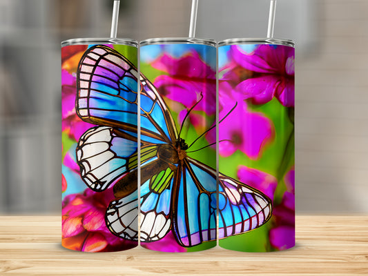 Three tumblers featuring a blue morpho butterfly against pink flowers.