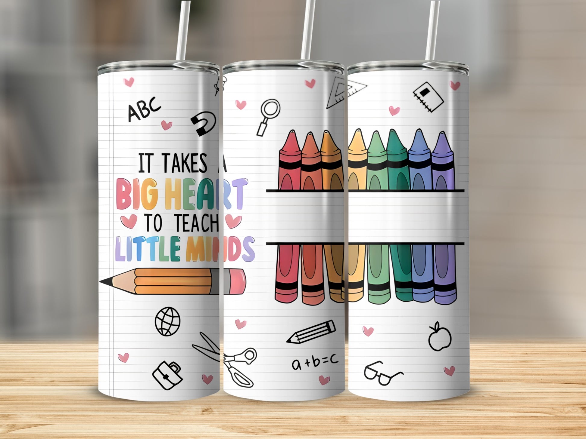 Tumbler with crayons, pencil, and "It takes a big heart to teach little minds" text.