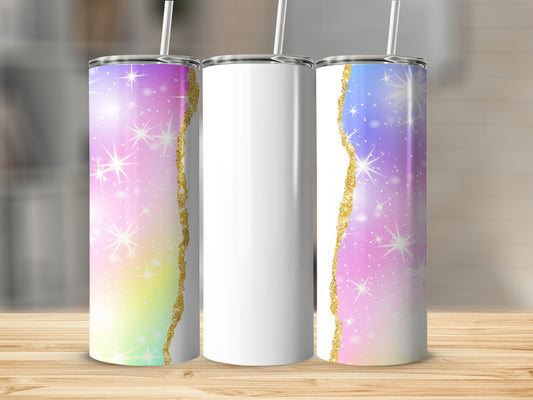 Three tumblers with a colorful glittery, starry background and gold trim.