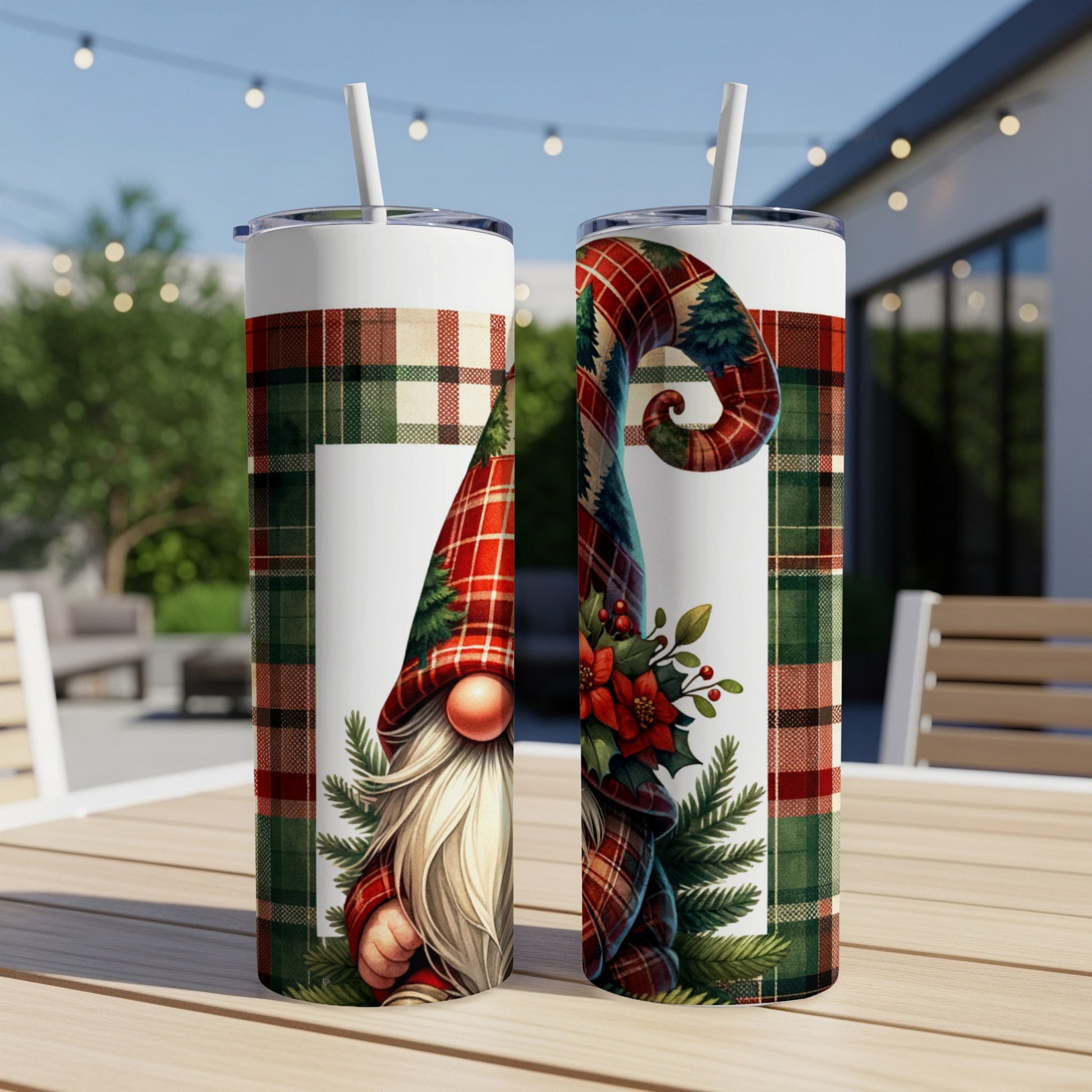 Two skinny tumblers with Christmas gnome and plaid patterns.