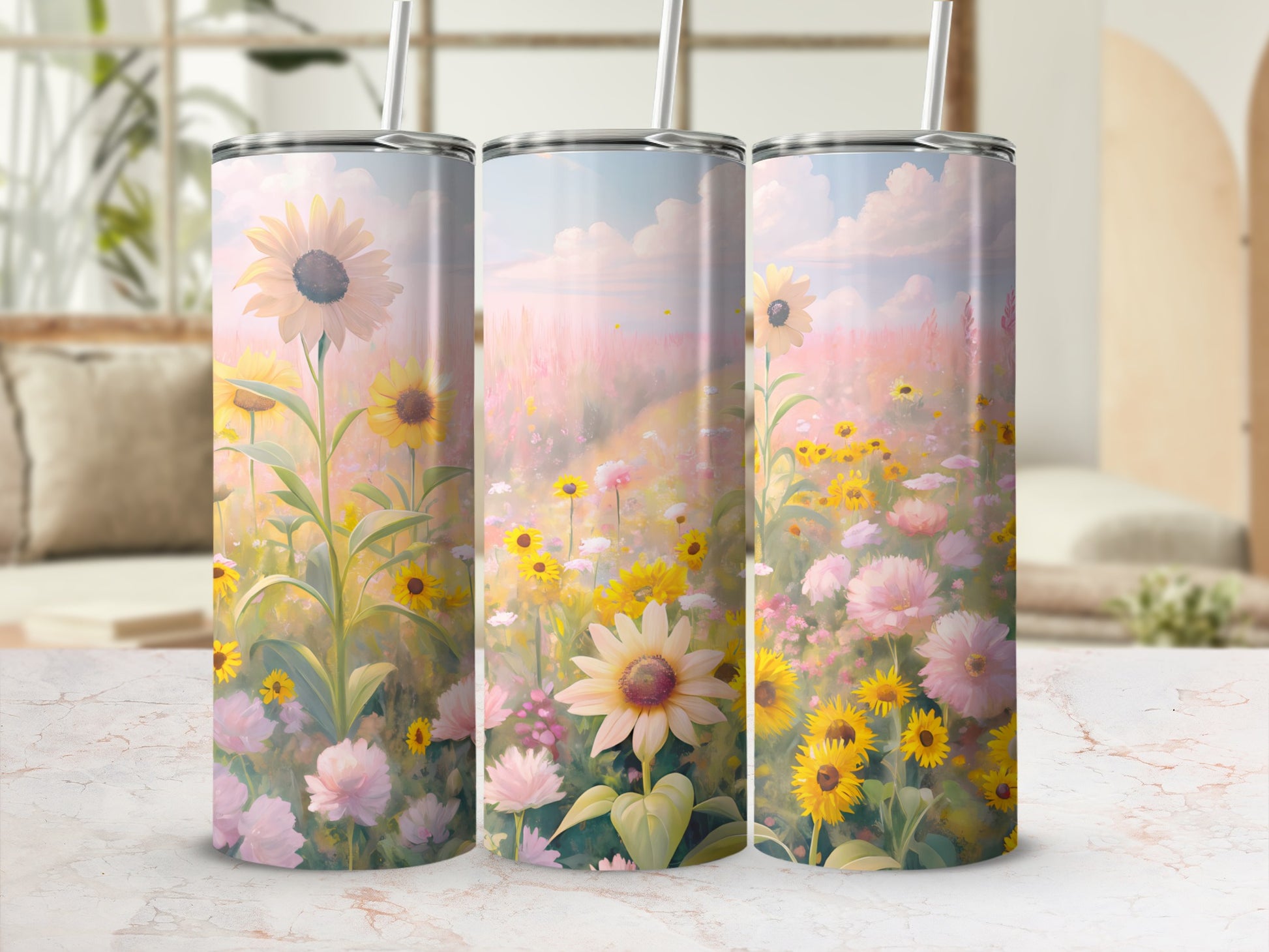 Three tumblers with a pastel floral meadow scene, featuring sunflowers and daisies.