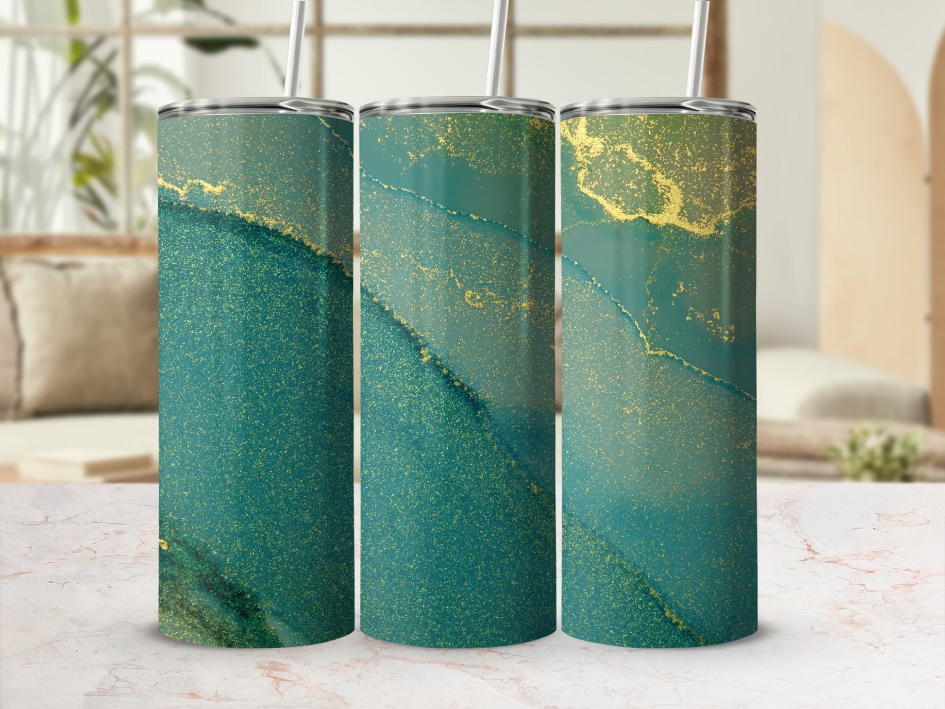 Three tumblers with a green and gold abstract marbled design.