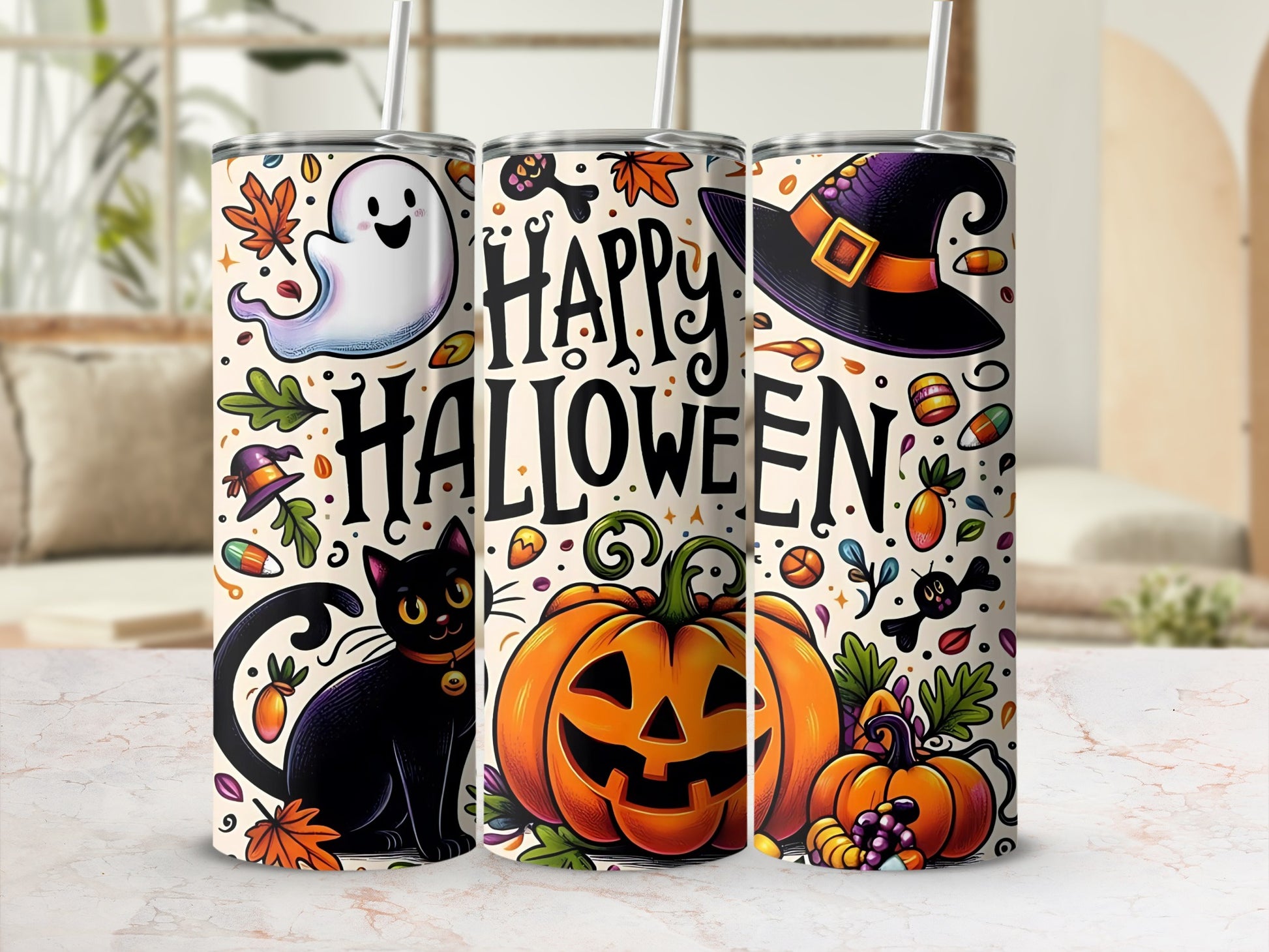 Three tumblers with Halloween designs including a ghost, black cat, pumpkins, and witch hat.
