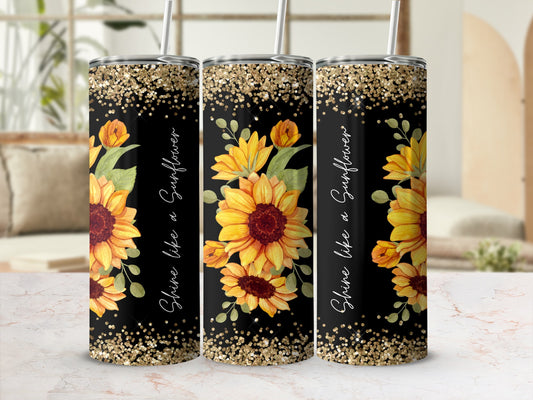 Black tumbler with sunflowers and gold glitter accent.