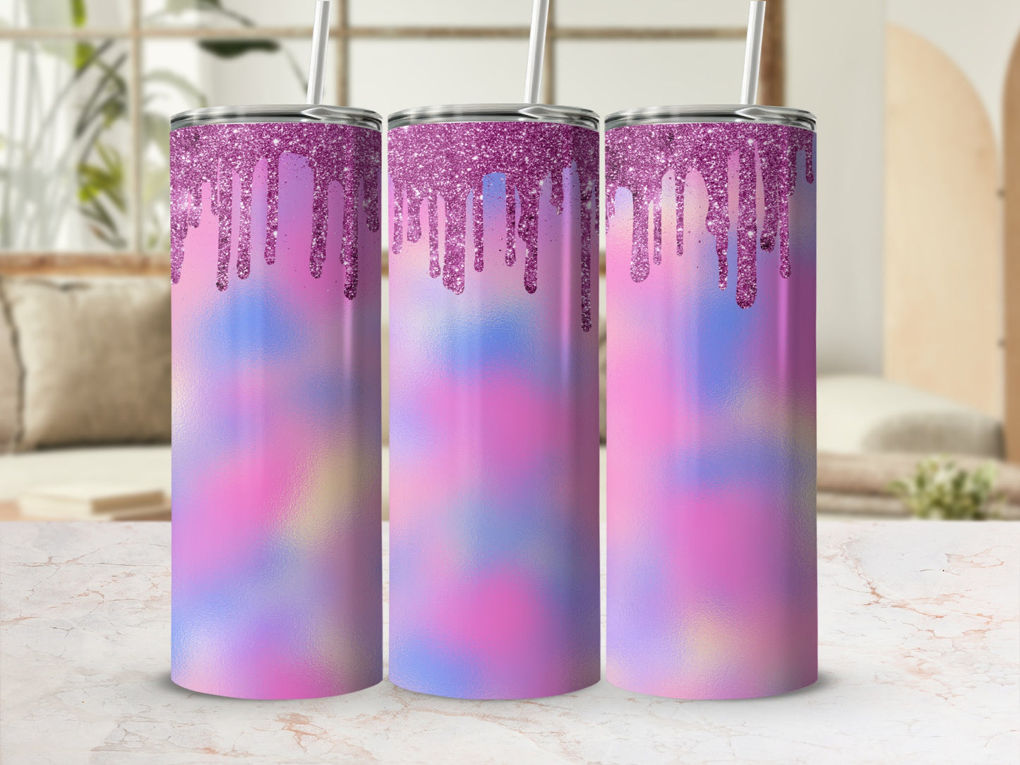 Three glitter-dripped tumblers with pastel tie-dye design.