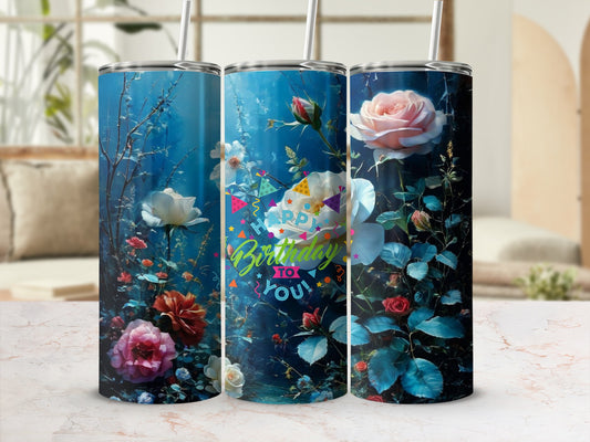 Blue tumbler with colorful flowers and "Happy Birthday to you" text.