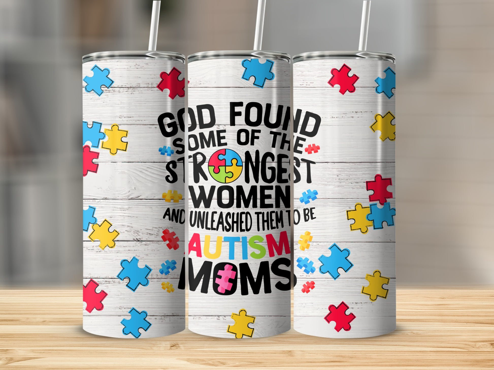 Tumbler with puzzle pieces and text "God found some of the strongest women and unleashed them to be Autism Moms."