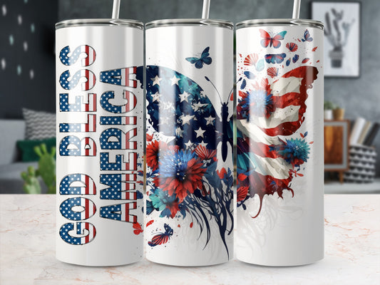 God Bless America text on a patriotic butterfly tumbler with flowers.