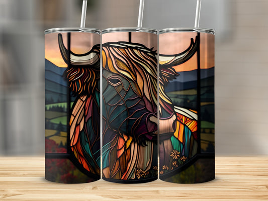 Stained glass Highland cow with colorful abstract design on a tumbler.
