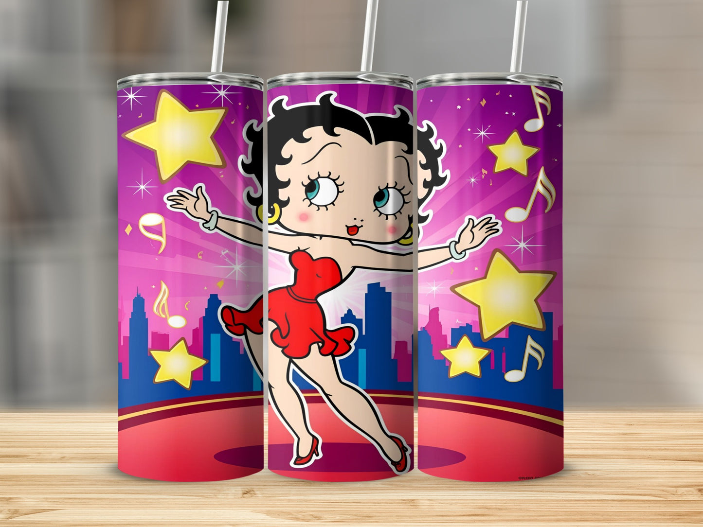 Betty Boop dancing with stars and city skyline on a purple tumbler.