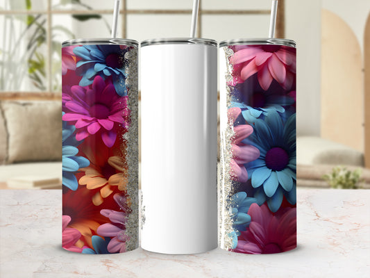 White tumbler with colorful floral pattern and glitter accents.