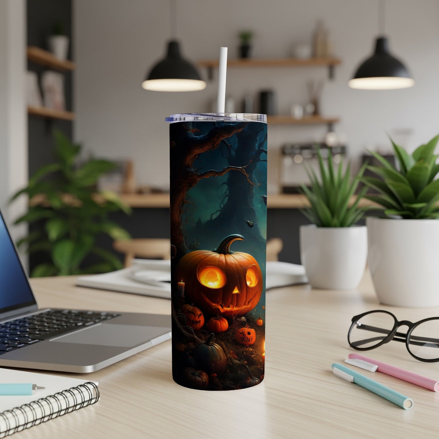 Tumbler with Halloween pumpkins, bats, and spooky trees design.