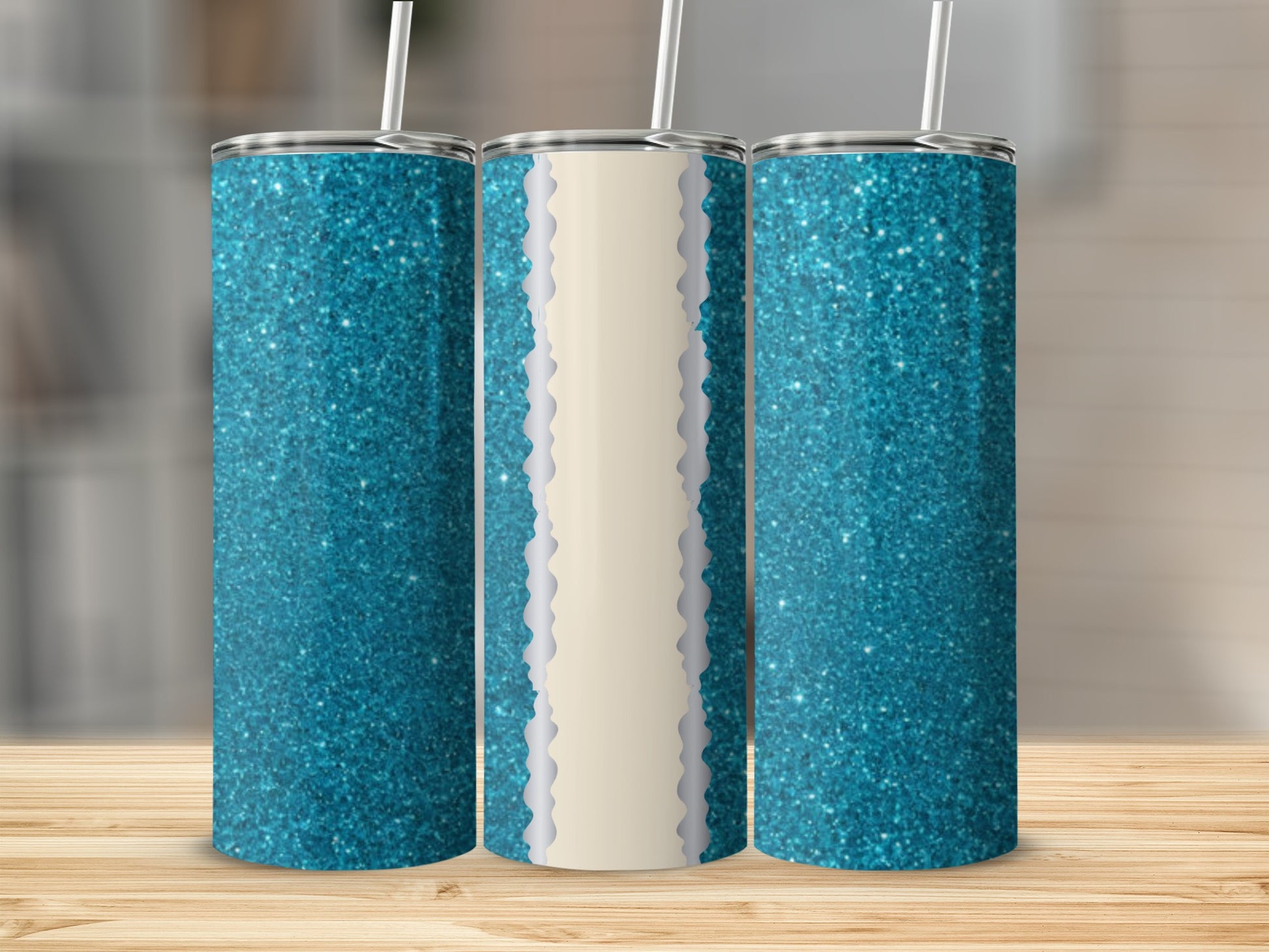 Three teal glitter tumblers with straw on a wooden surface.