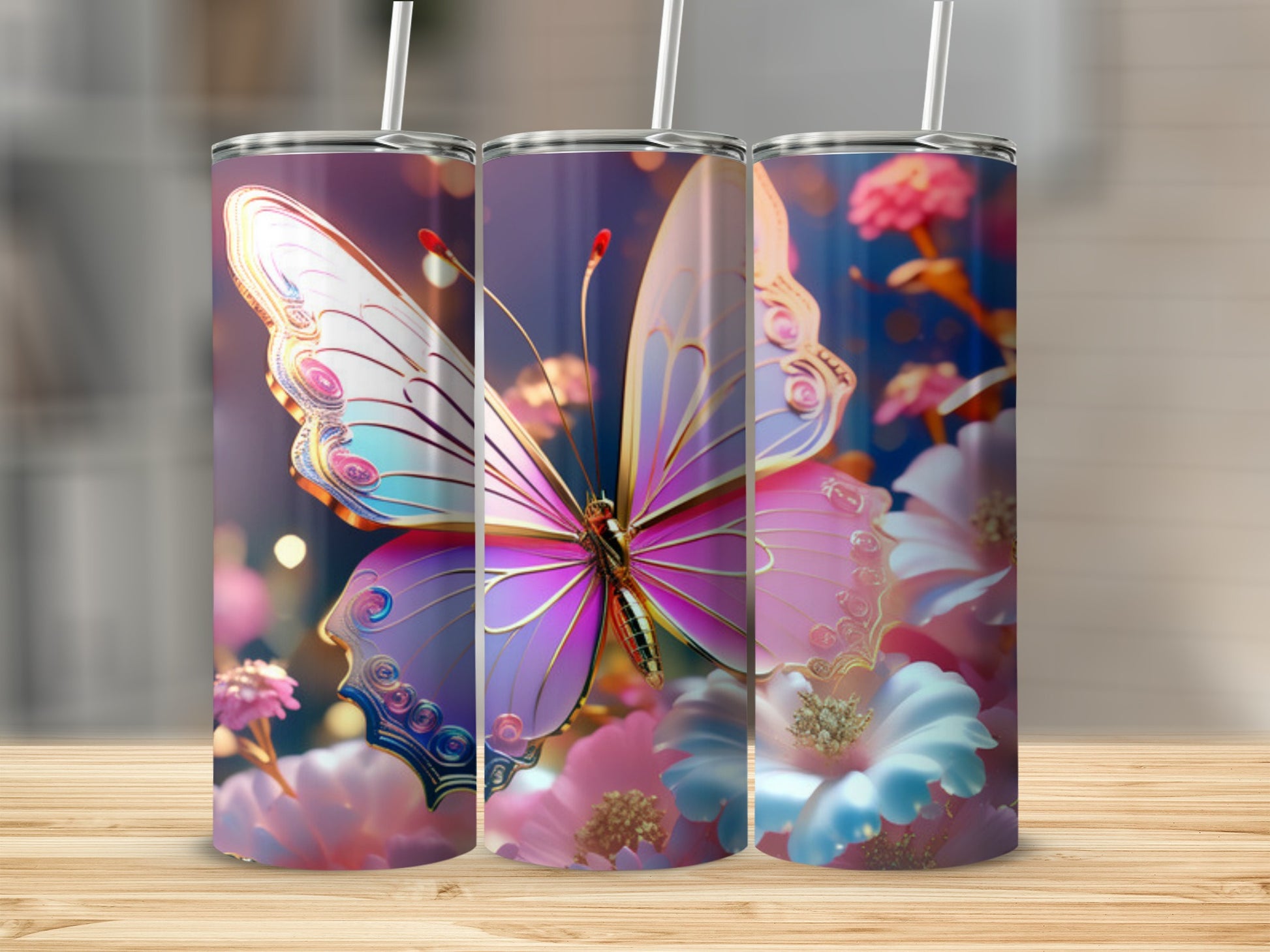 Butterfly and floral design on three tumblers.