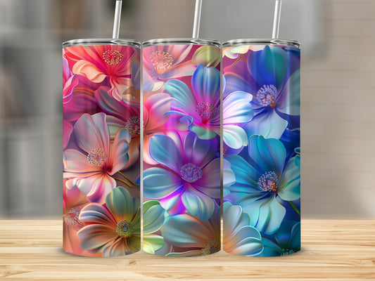 Three tumblers with vibrant, abstract floral designs in pink, blue, and teal.