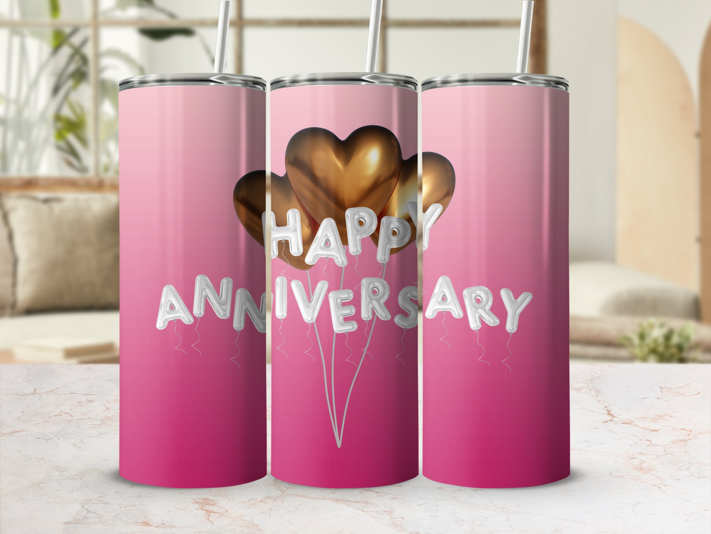 Pink gradient tumbler with "Happy Anniversary" in silver balloons and gold hearts.