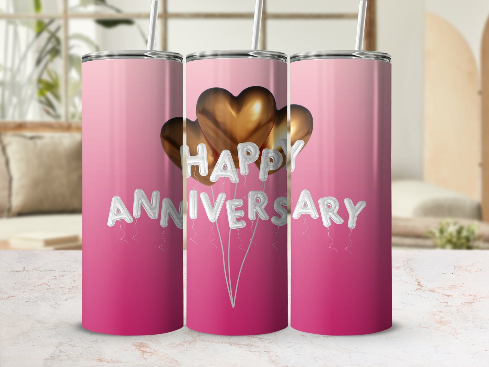 Pink gradient tumbler with "Happy Anniversary" in silver balloons and gold hearts.